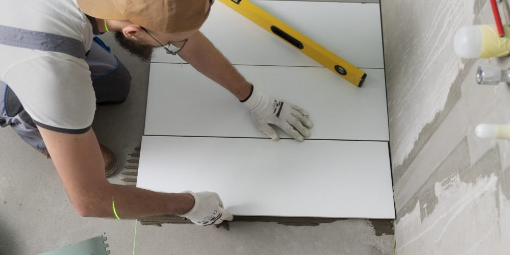 tiler-working-renovation-apartment